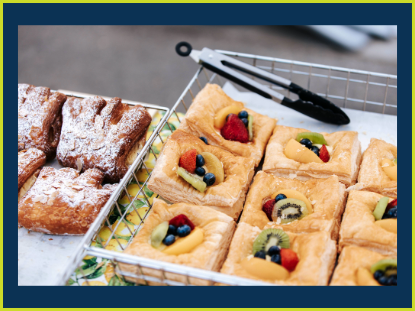 A basket filled with an assortment of delicious pastries, showcasing a variety of shapes and colors.