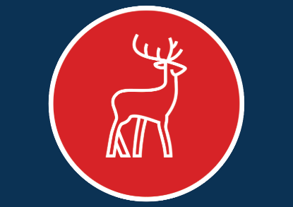 A stag centered in a circle against a vibrant red background